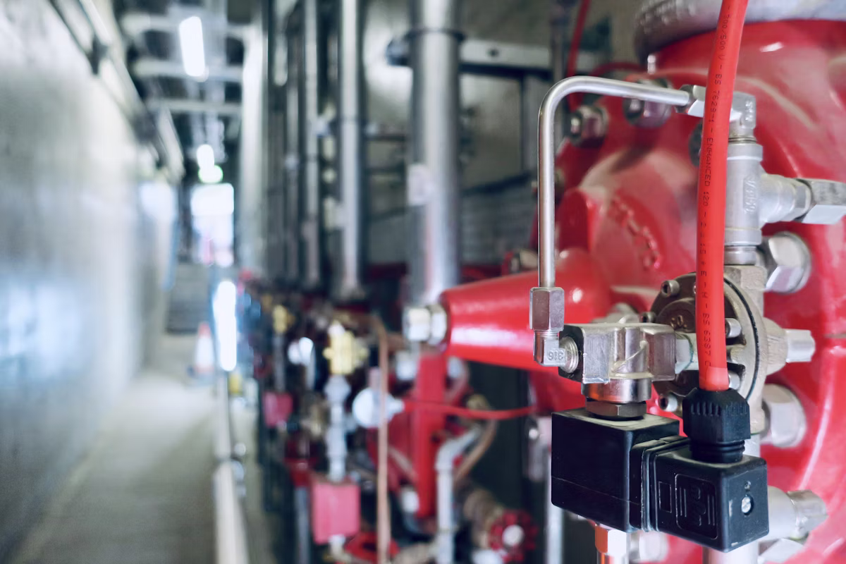 Close-up of hydraulic pipes and valves